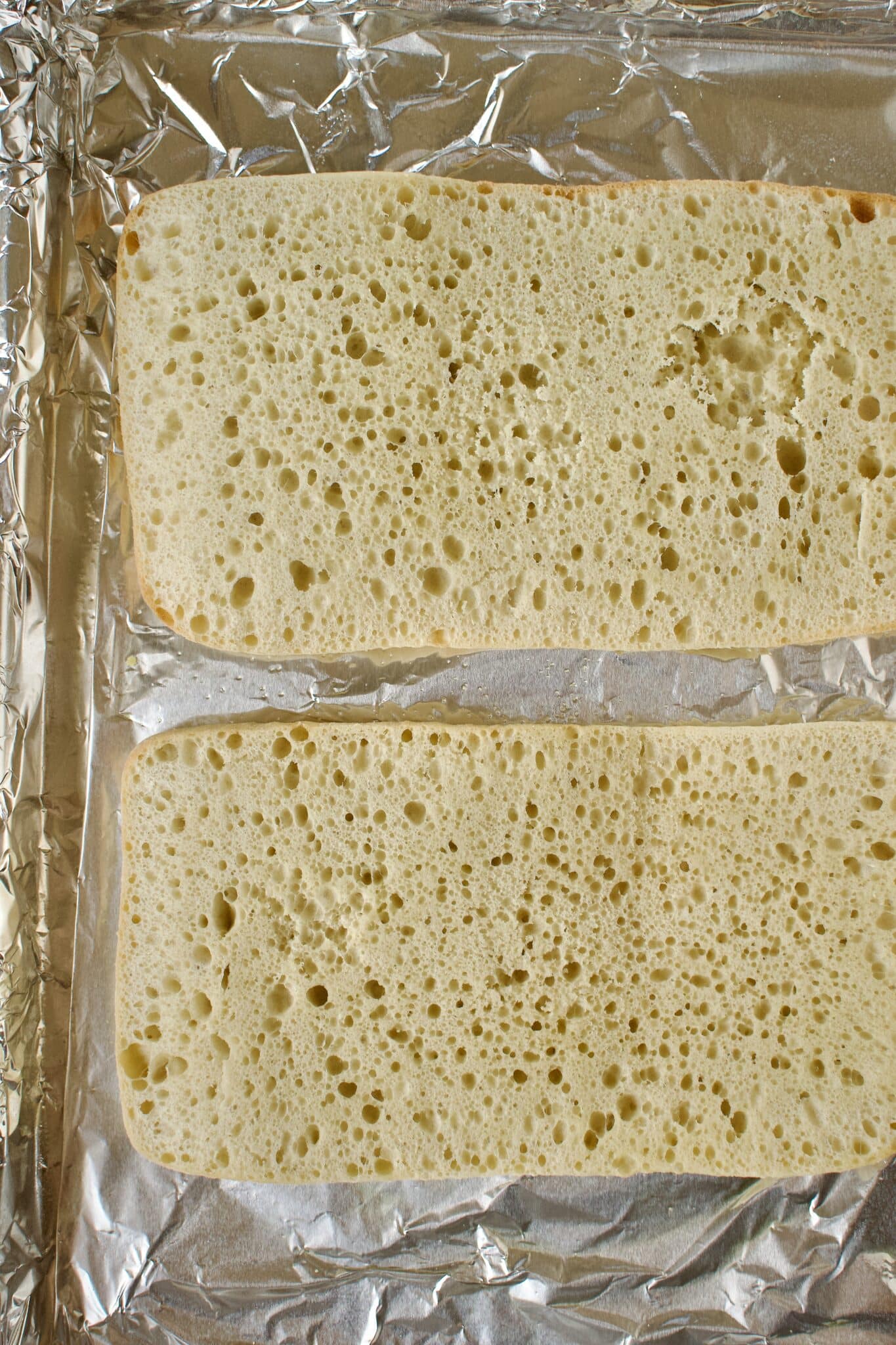 Sliced Ciabatta loaf ready to be buttered and toasted.