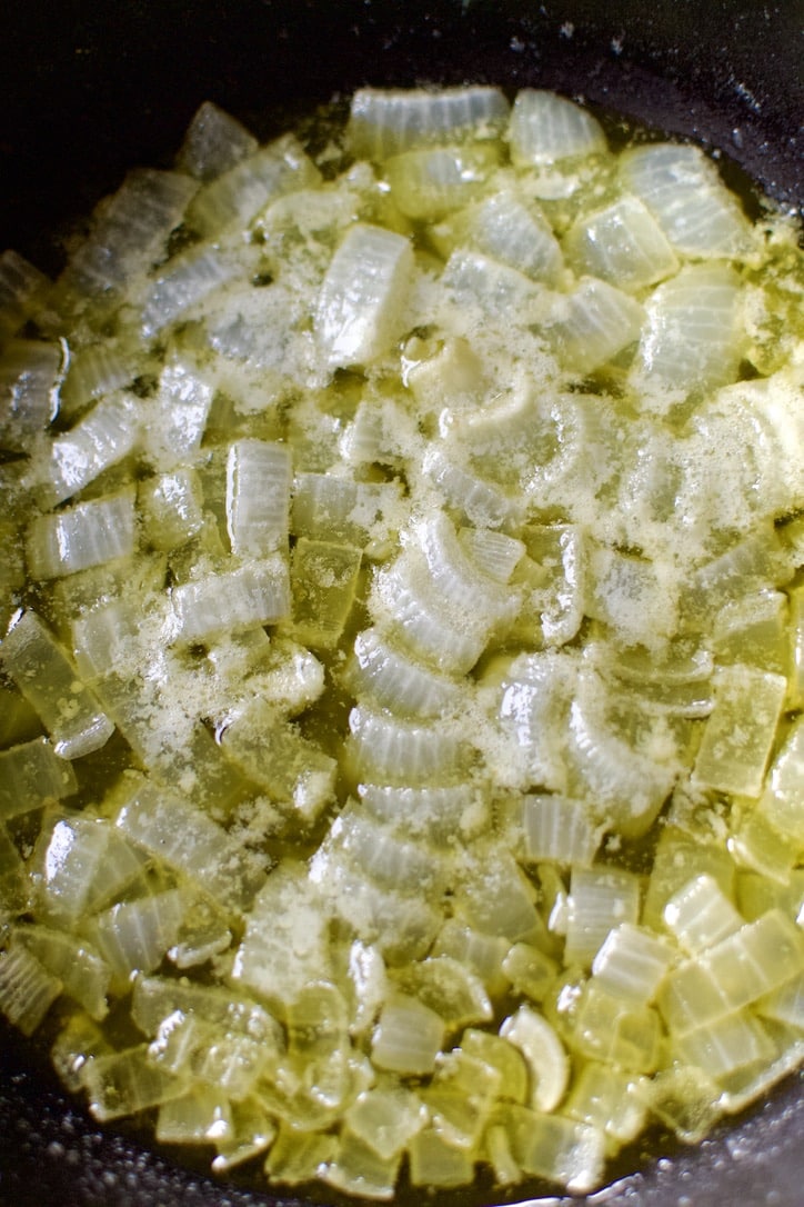 Onions cooked in butter till soft.