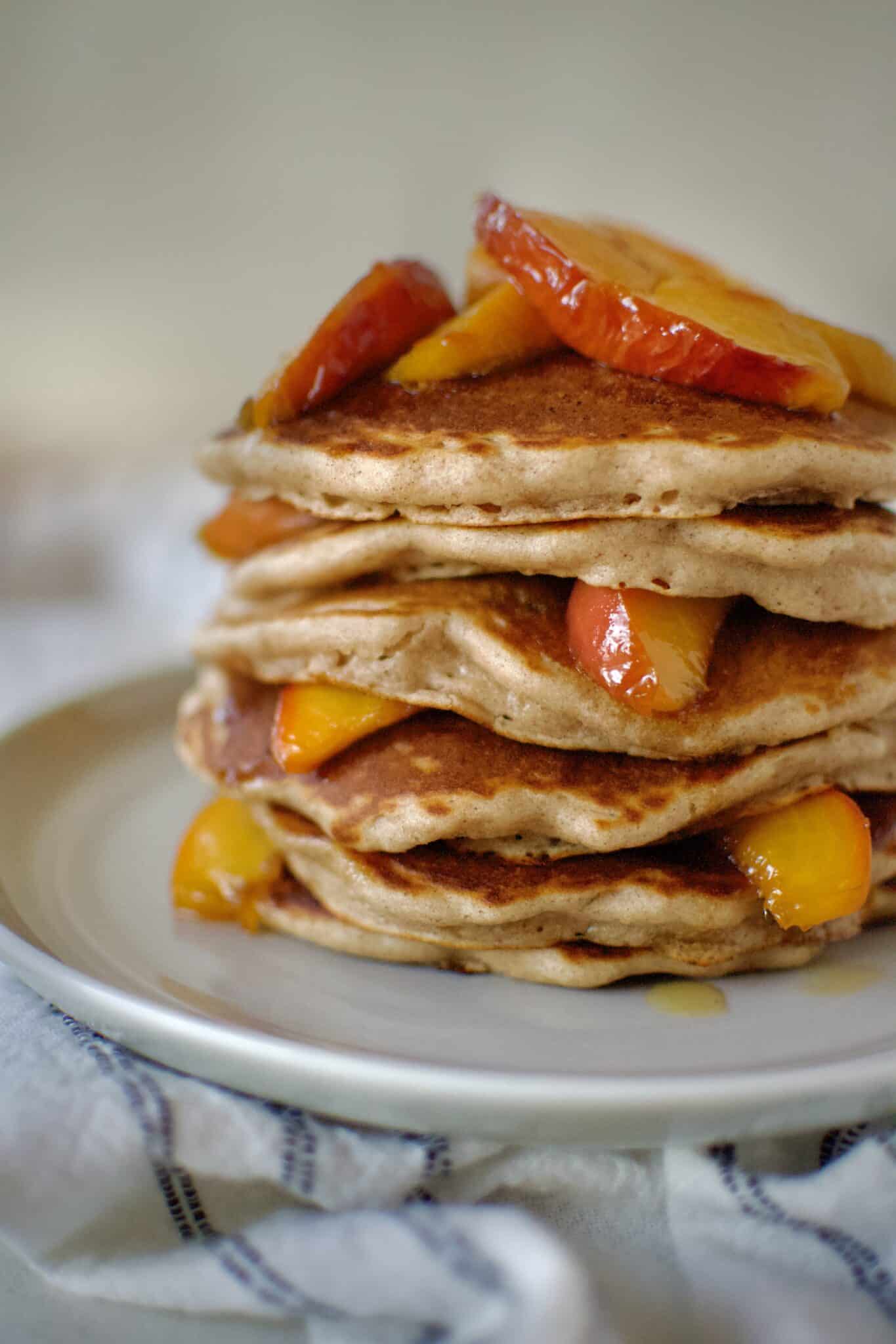 Peach Pancakes on a plate ready to eat.