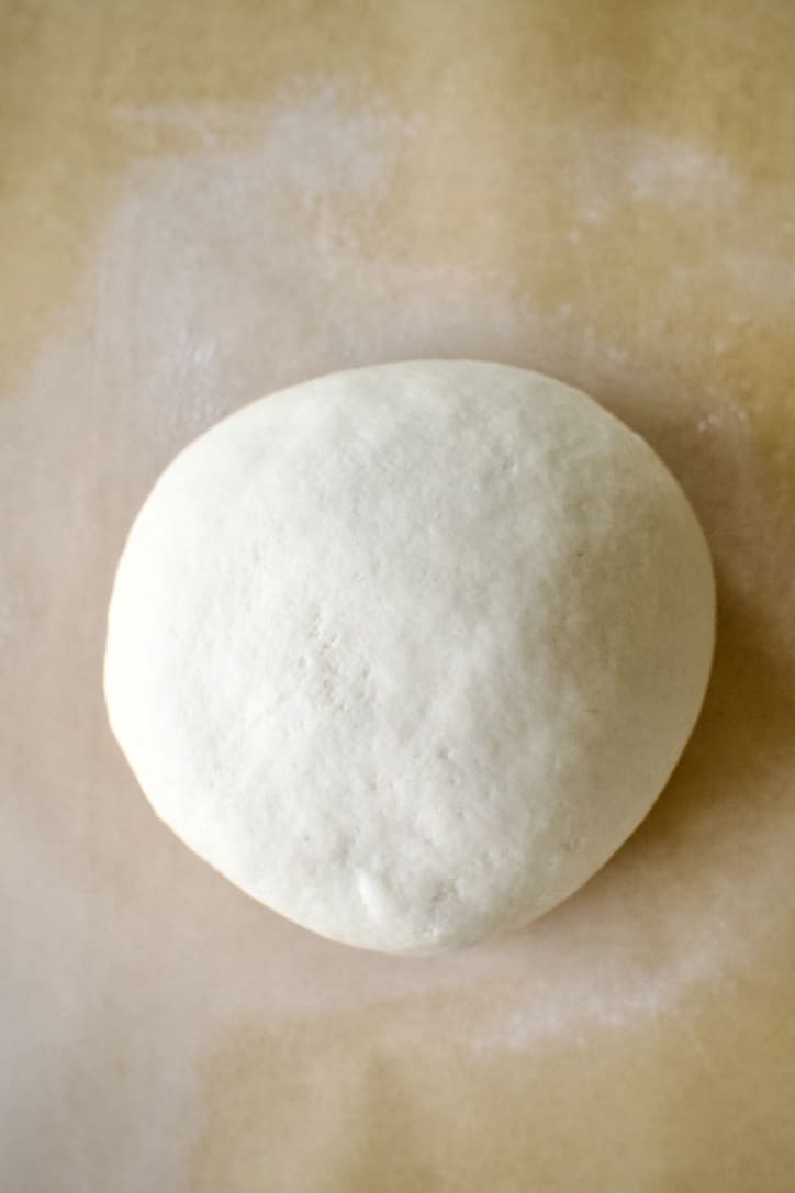 Pizza dough left to rest of rising.