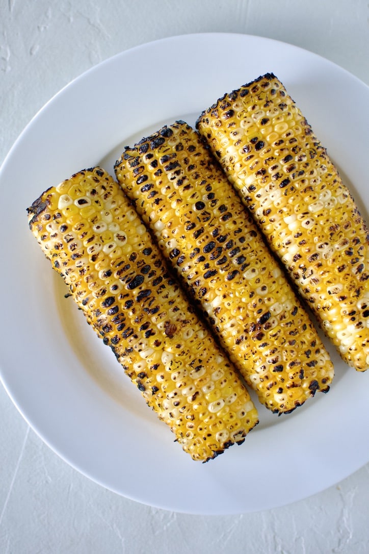 Corn grilled until charred.