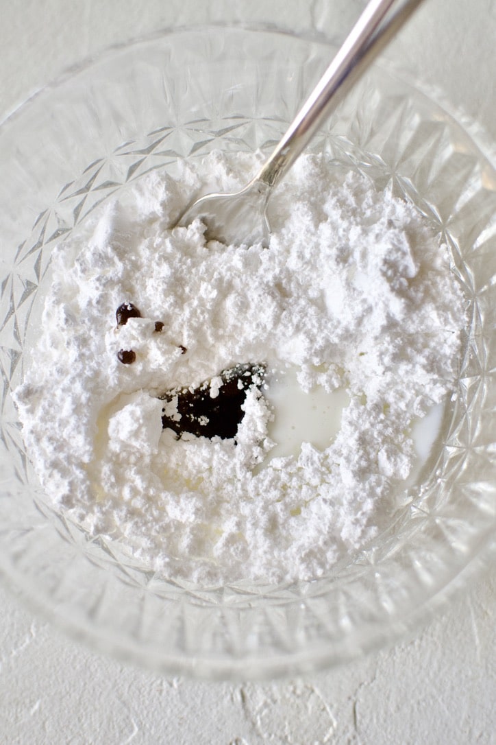 Glaze ingredients in a bowl with a fork.