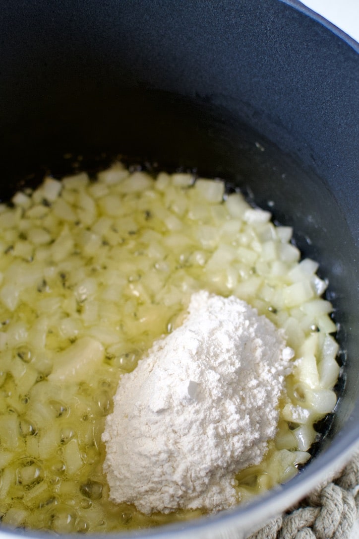 Cooked onions in butter, adding flour to make a roux.