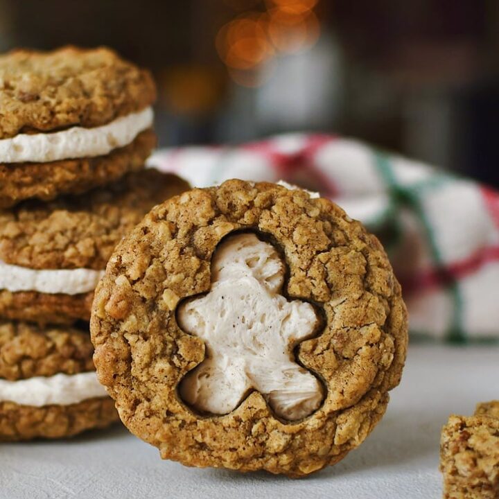 Gingerbread Oatmeal Cream Pie with the shape of gingerbread man cut out of one side and sandwiched together.