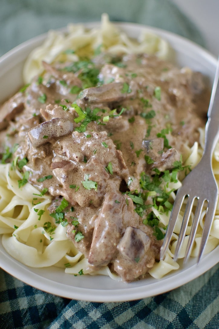 Easy Beef Stroganoff over a bed of egg noodles ready to eat.