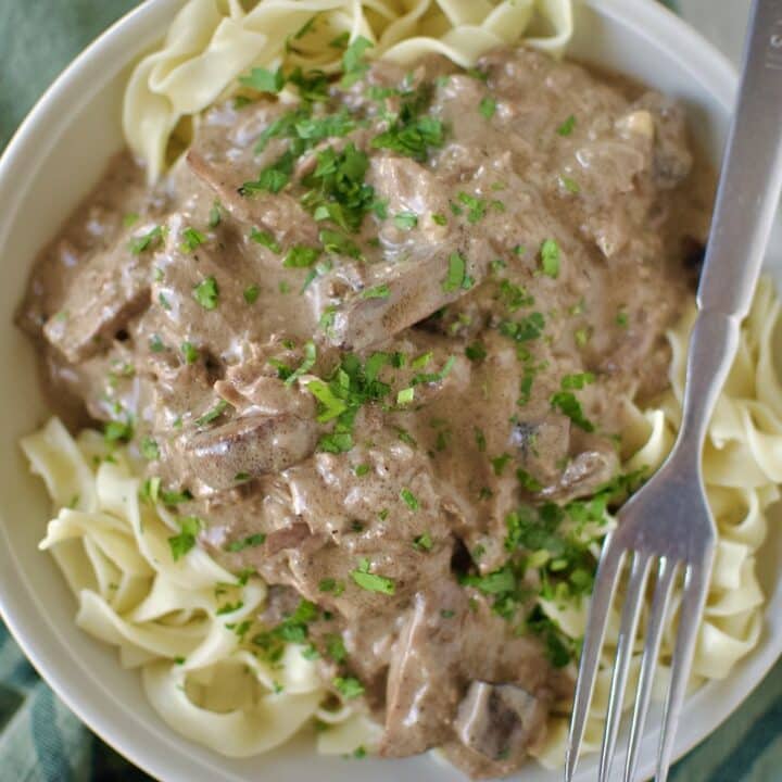 Easy Beef Stroganoff over a bed of egg noodles ready to eat.