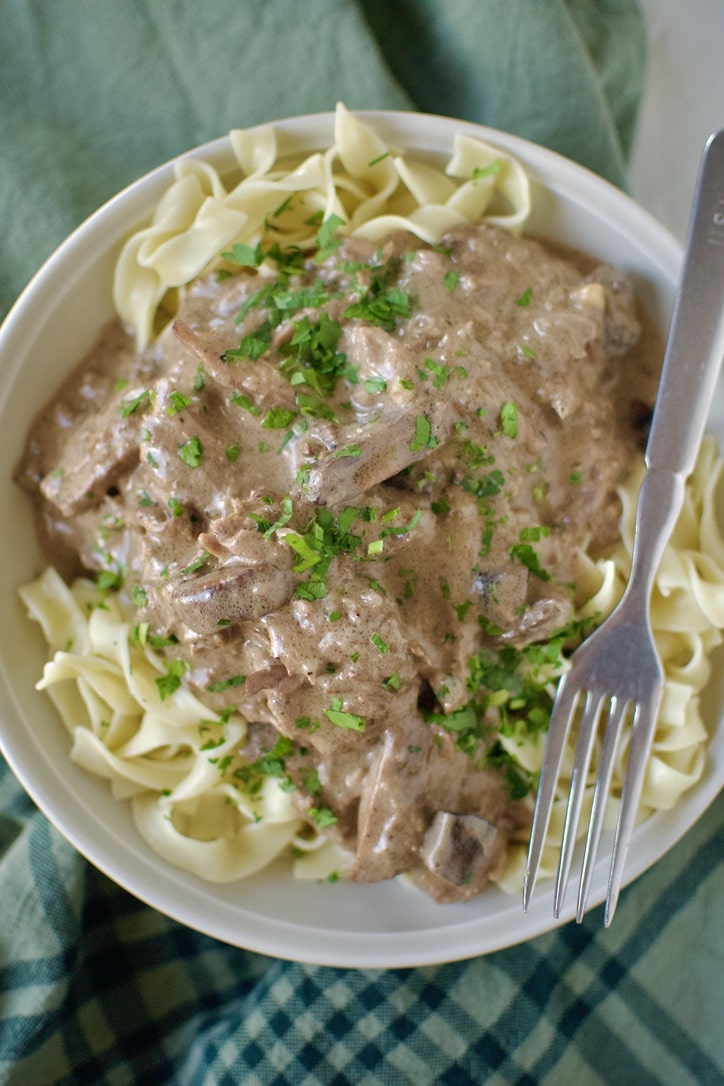 Easy Beef Stroganoff over a bed of egg noodles ready to eat.