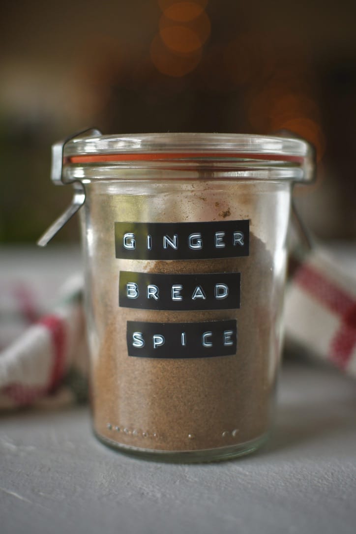 Gingerbread Spice that has been blended and placed in a glass storage container.