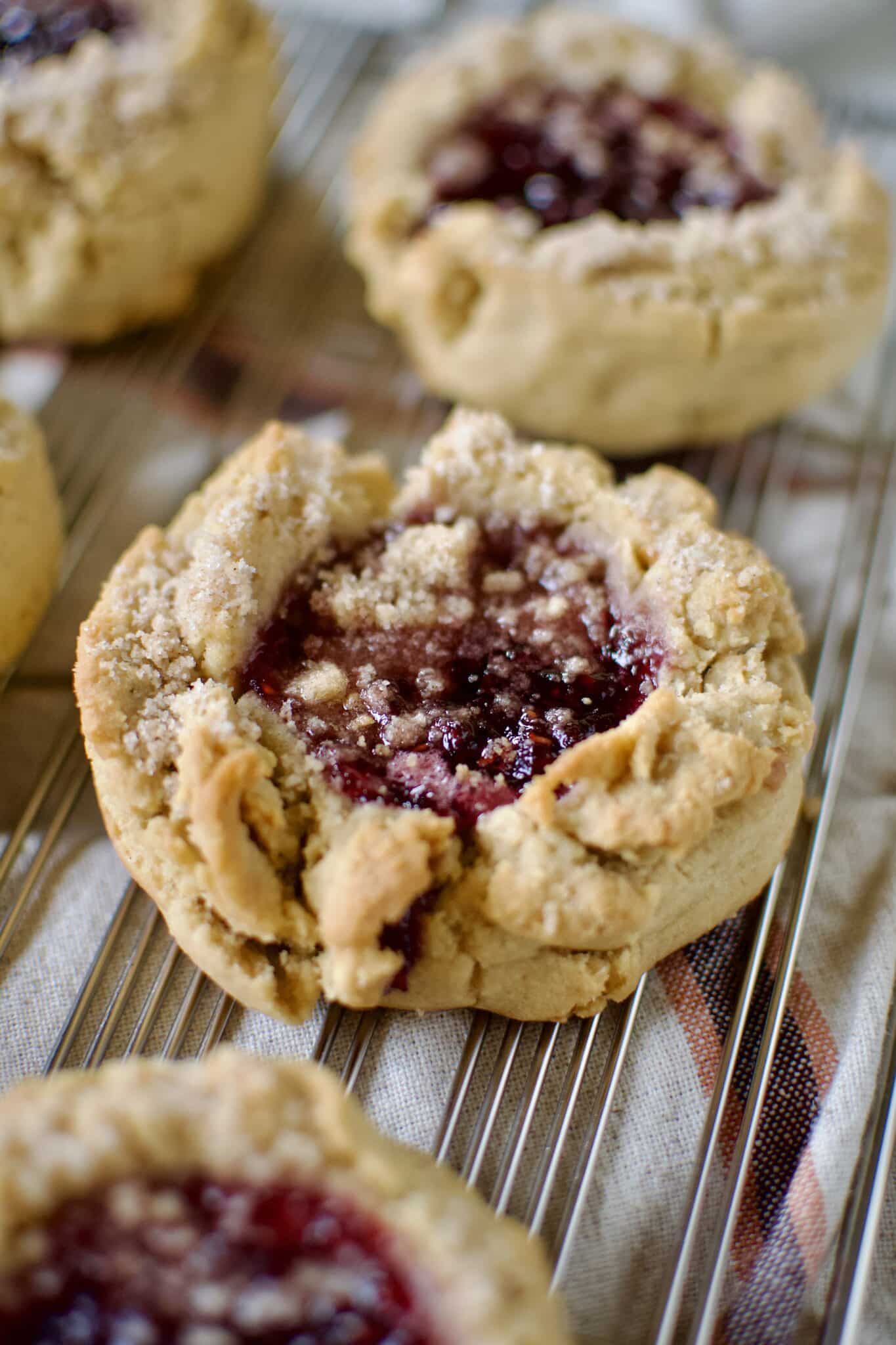 Peanut Butter and Jelly Cookies on a cooling rack.