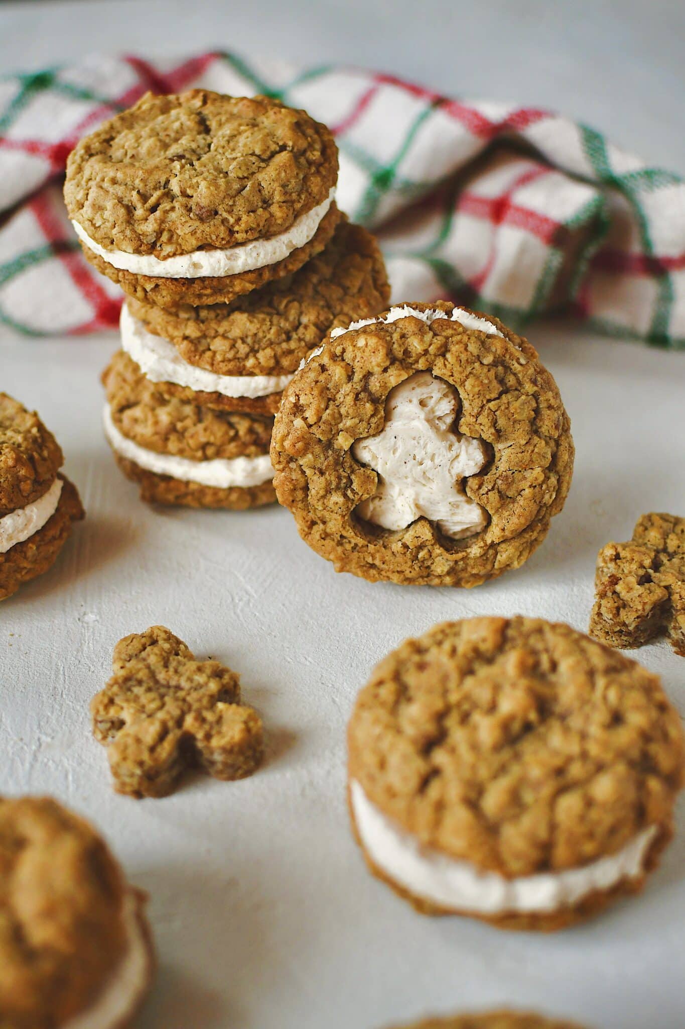 Gingerbread Oatmeal Cream Pie with the shape of gingerbread man cut out of one side and sandwiched together.