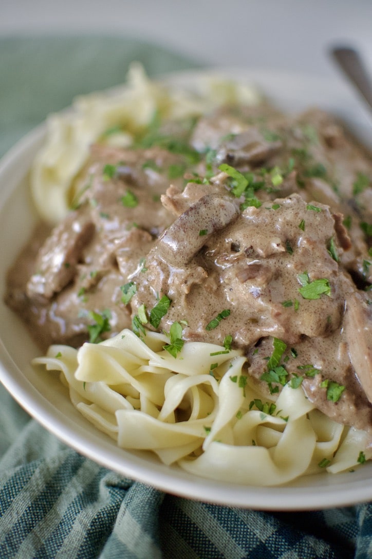 Easy Beef Stroganoff over a bed of egg noodles ready to eat.