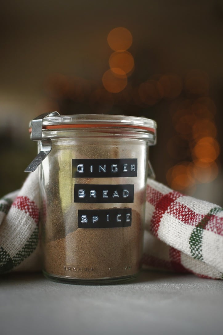 Gingerbread Spice that has been blended and placed in a glass storage container.