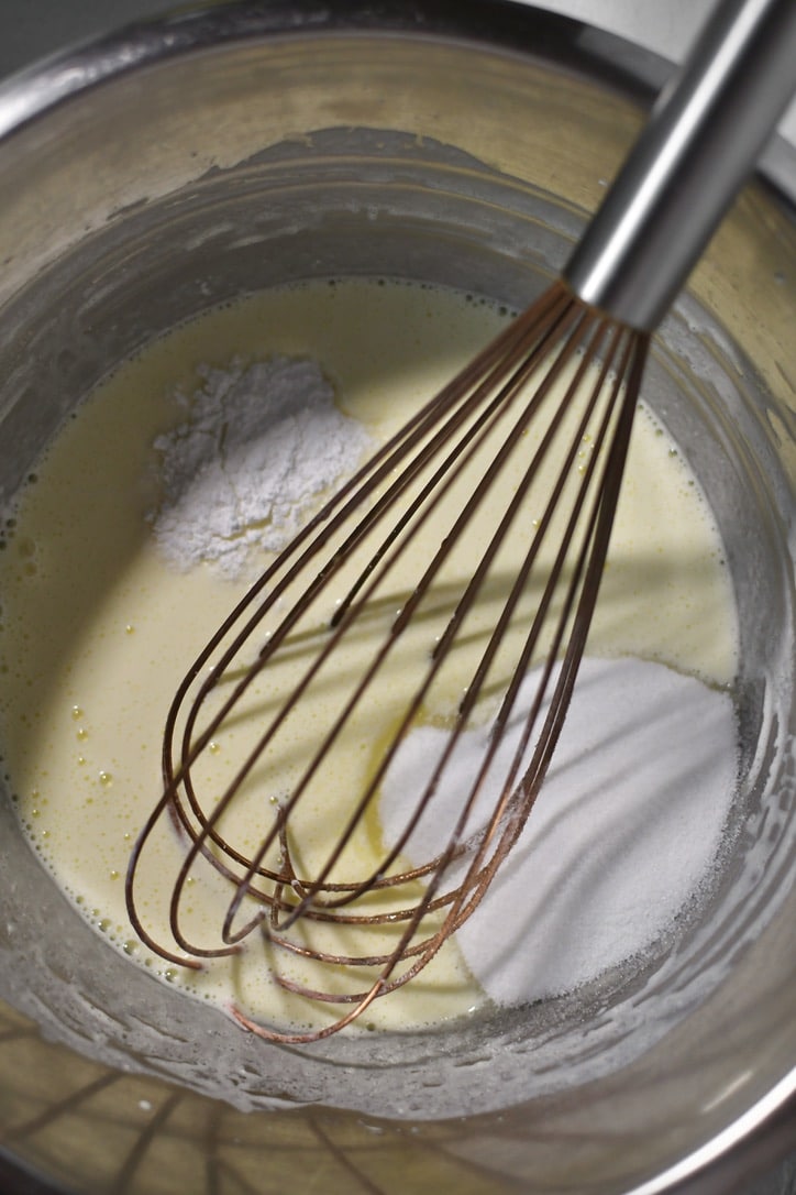 Milk, eggs, and oil in a bowl whisked together, adding the sugar, baking soda, and salt to the bowl.