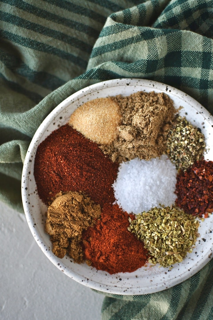 Taco Seasoning ingredients on a plate ready to be mixed up.