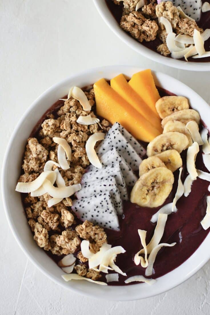 Smoothie Bowl, topped with fresh and dried fruit, ready to eat.
