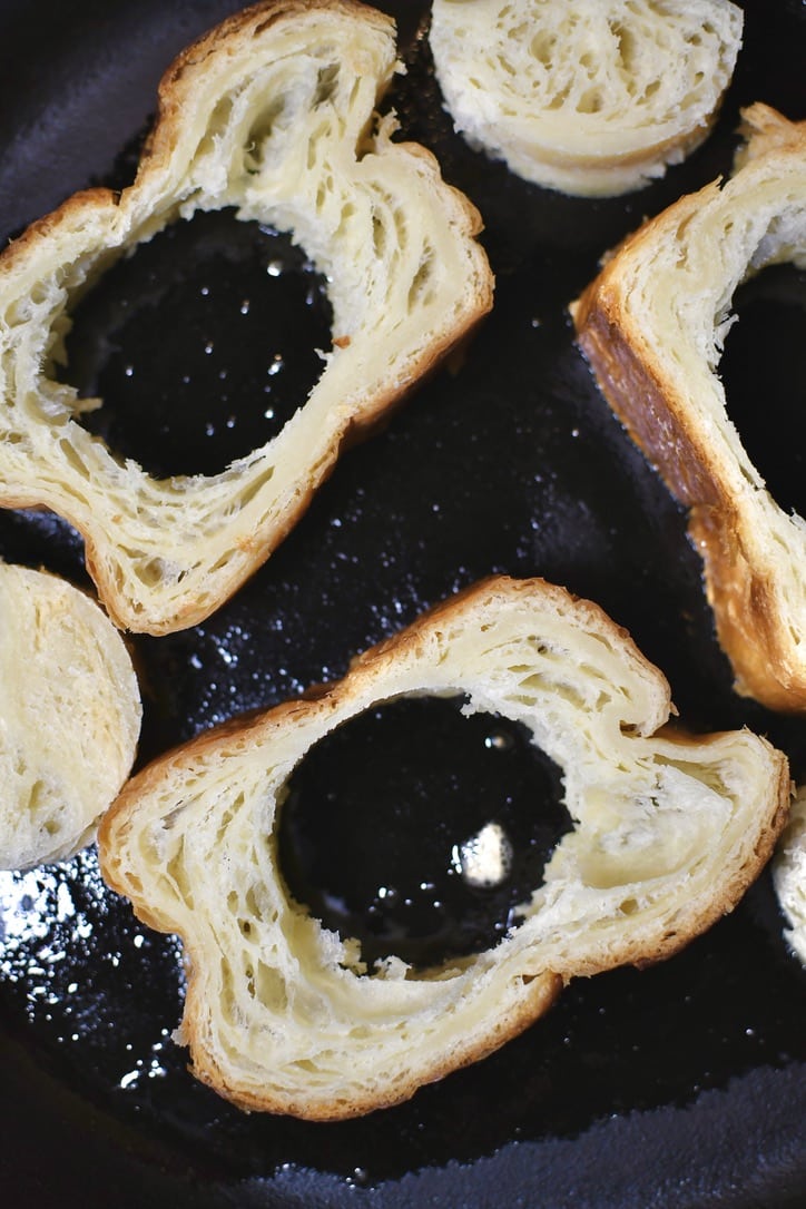 Bread and the centers place in a warm pan to toast the buttered side.