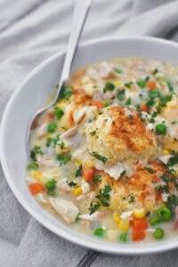 Chicken and Biscuits served up in a bowl ready to be enjoyed.