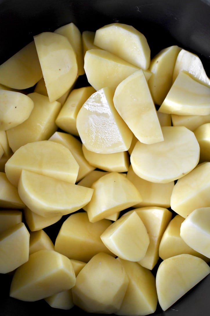 Cut potatoes before boiling.