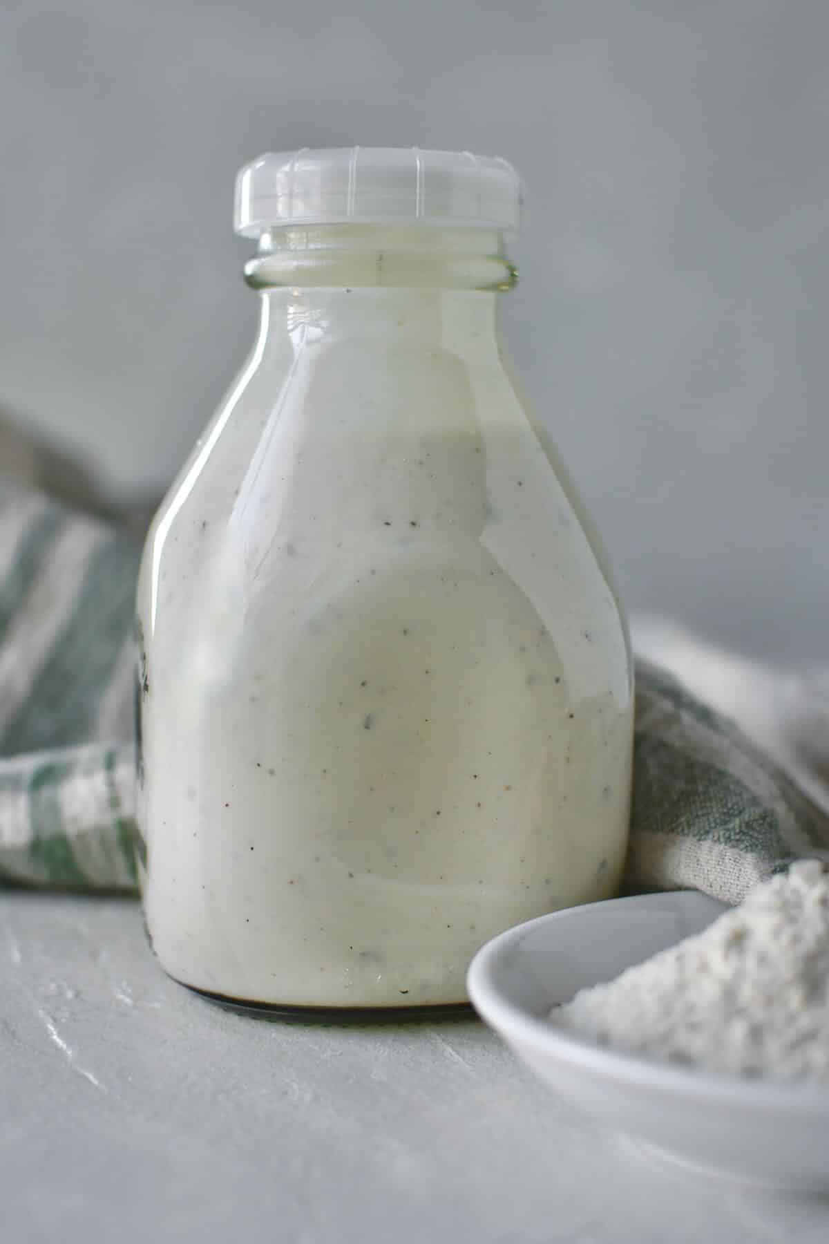 Ranch Dressing in a jar ready to be used or stored.