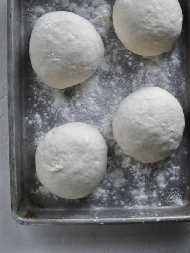 Portioned dough resting for a second rise.