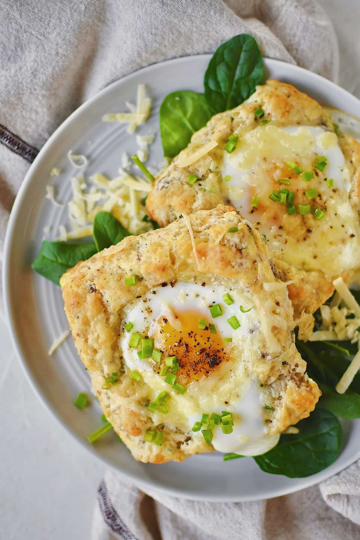 Sausage, Egg, and Cheese Biscuits on a plate ready to eat.