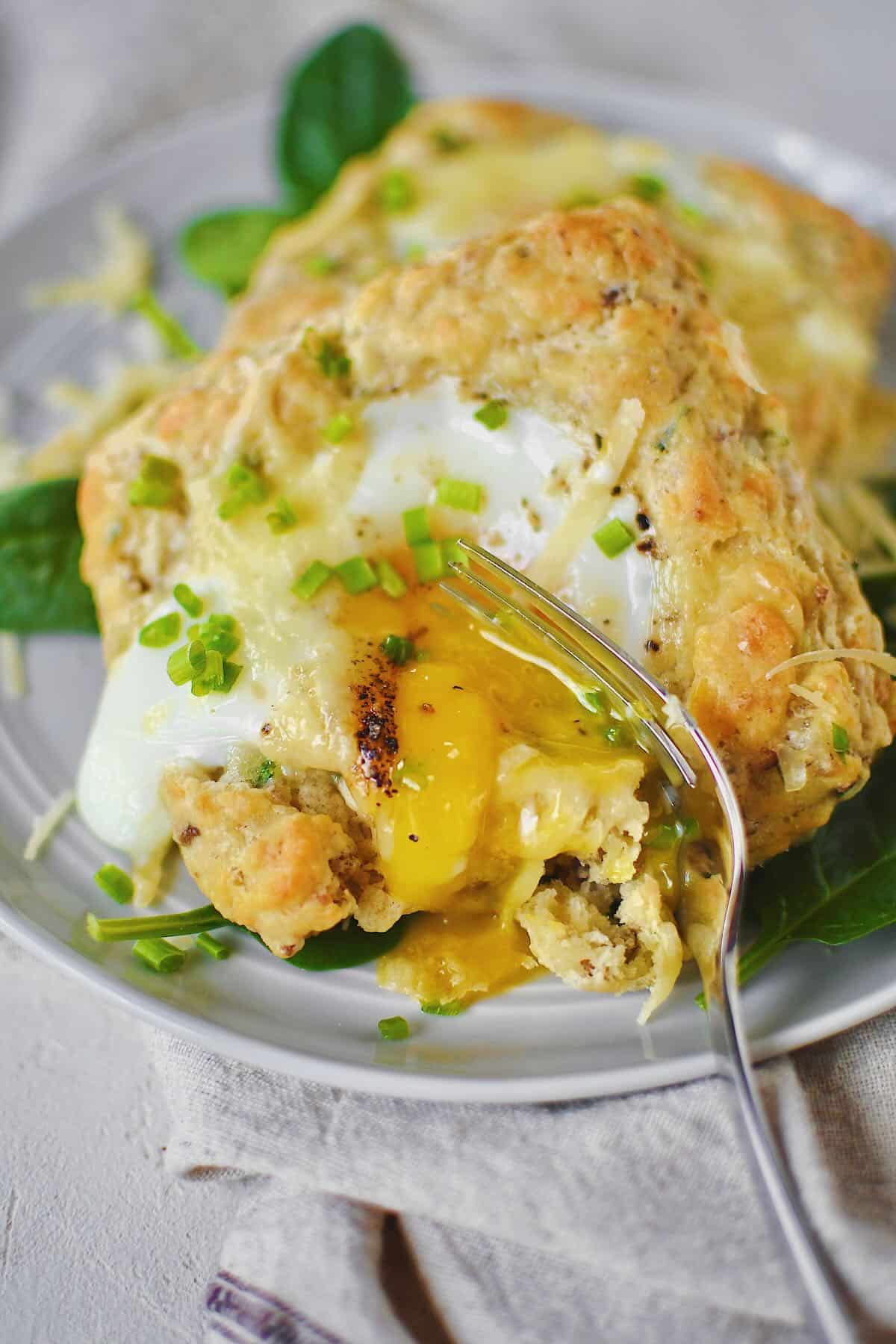 Sausage, Egg, and Cheese Biscuits on a plate ready to eat.