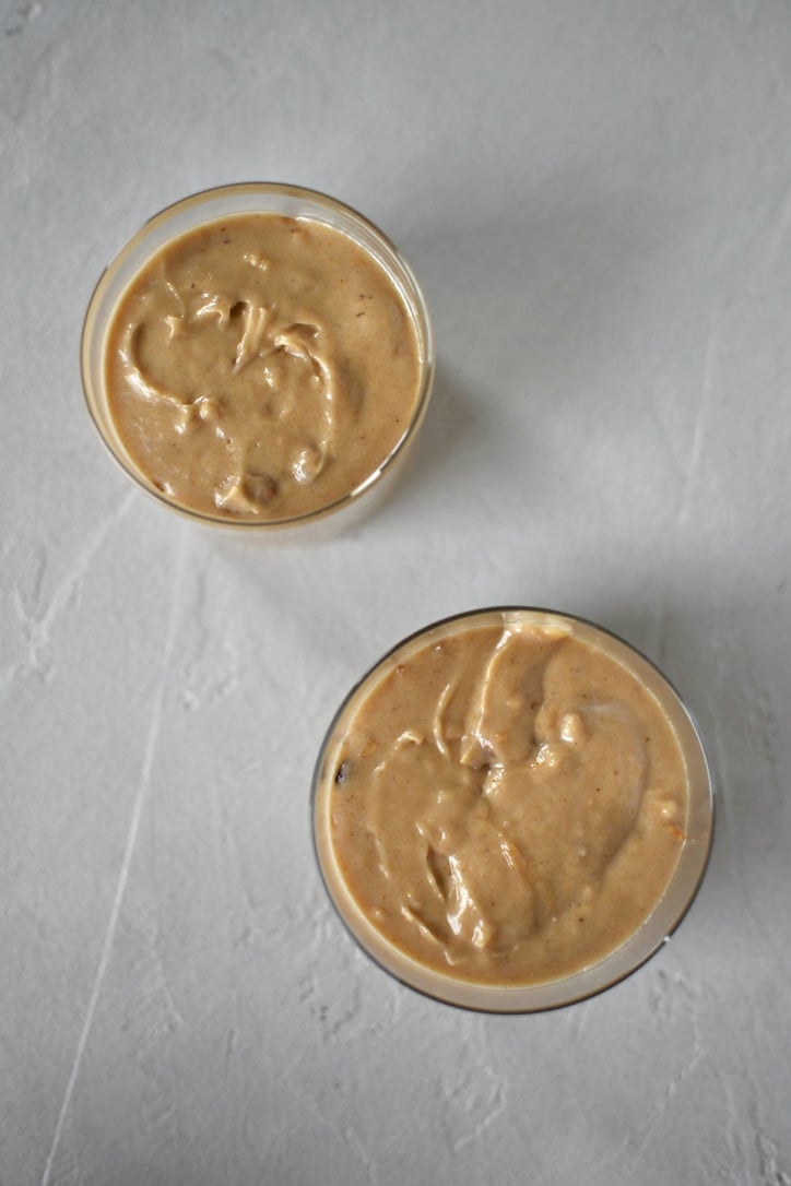 Whipped Peanut Butter Mousse placed in jars before chilling.