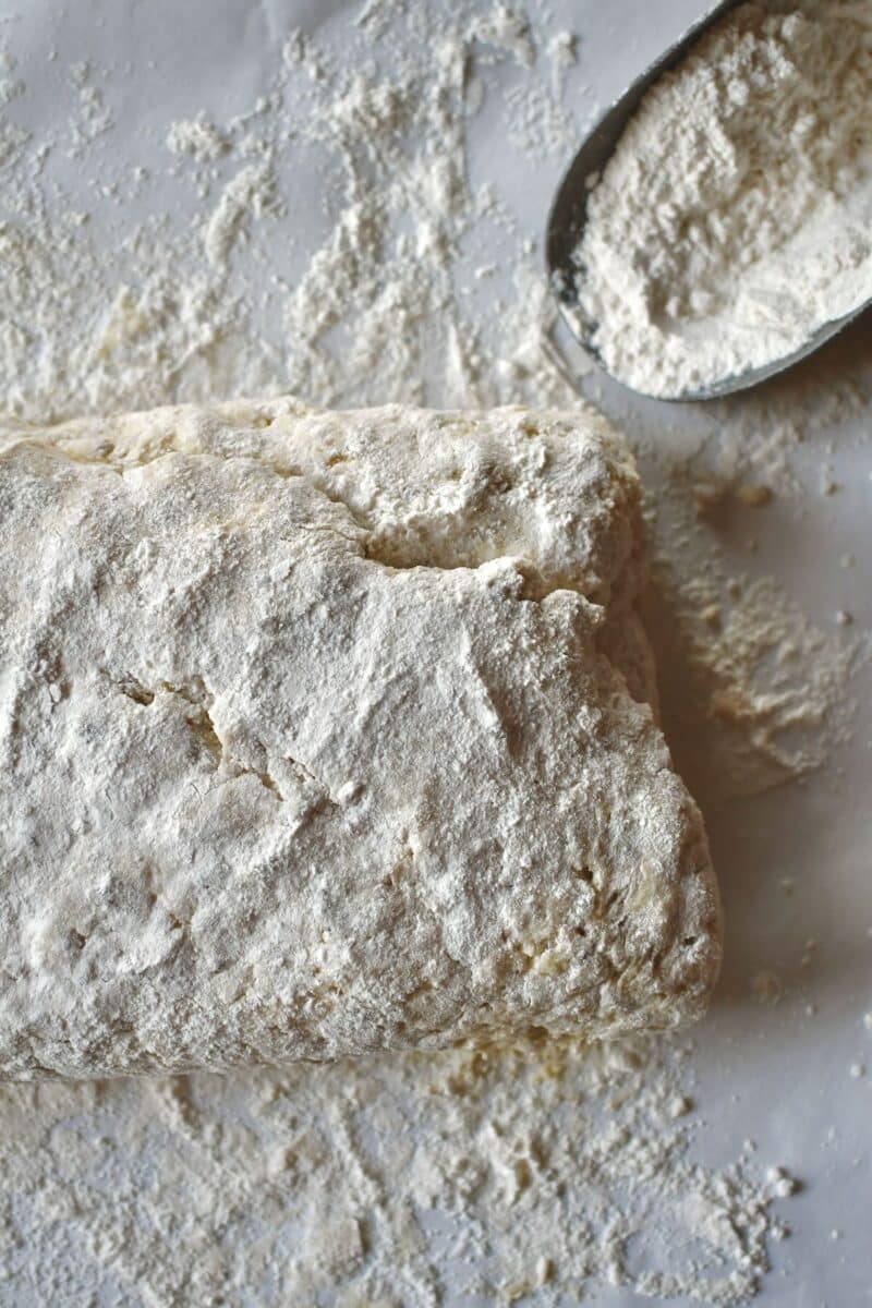 Letter folding the biscuit dough to create layers.