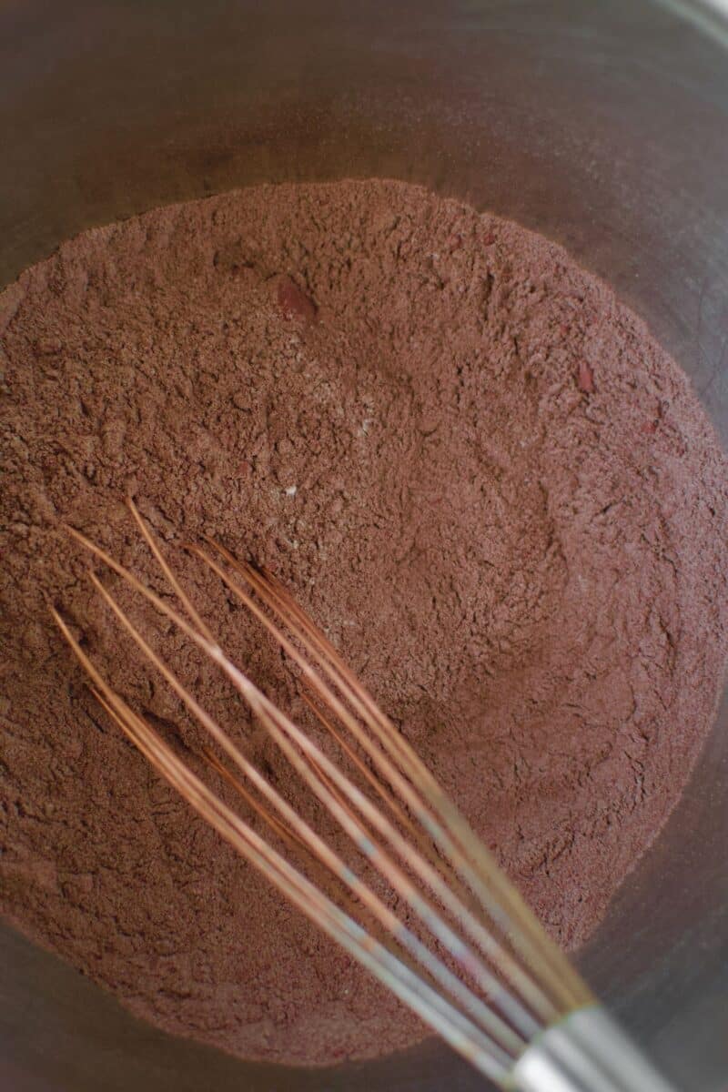 All dry ingredients placed in a bowl and whisked together.