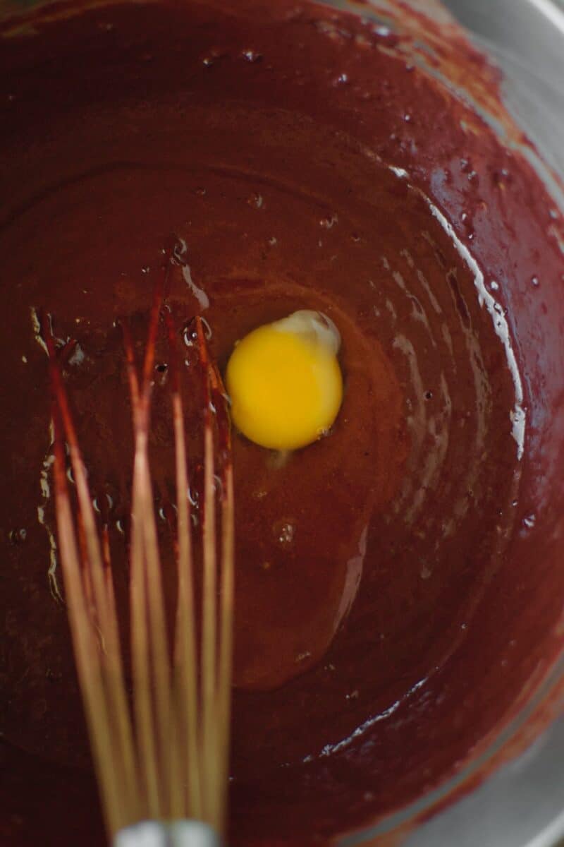 All dry ingredients placed in a bowl and whisked together with milk and butter, adding the egg.