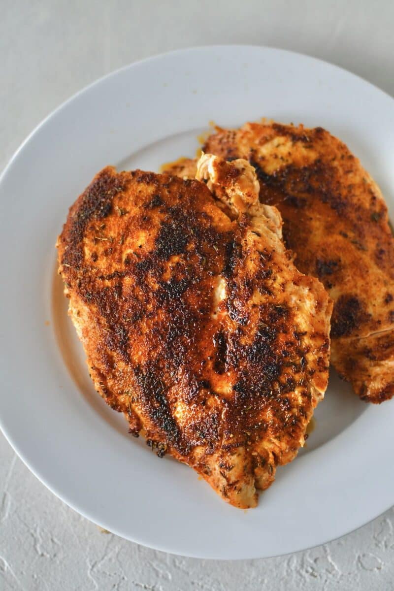 Chicken breasts after searing in the pan.