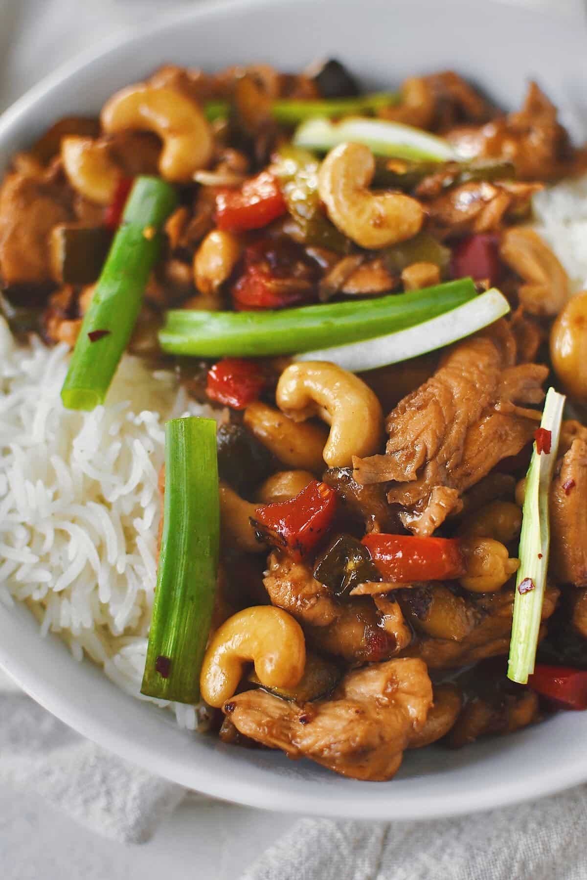 Cashew Chicken served over steamed basmati rice ready to eat.