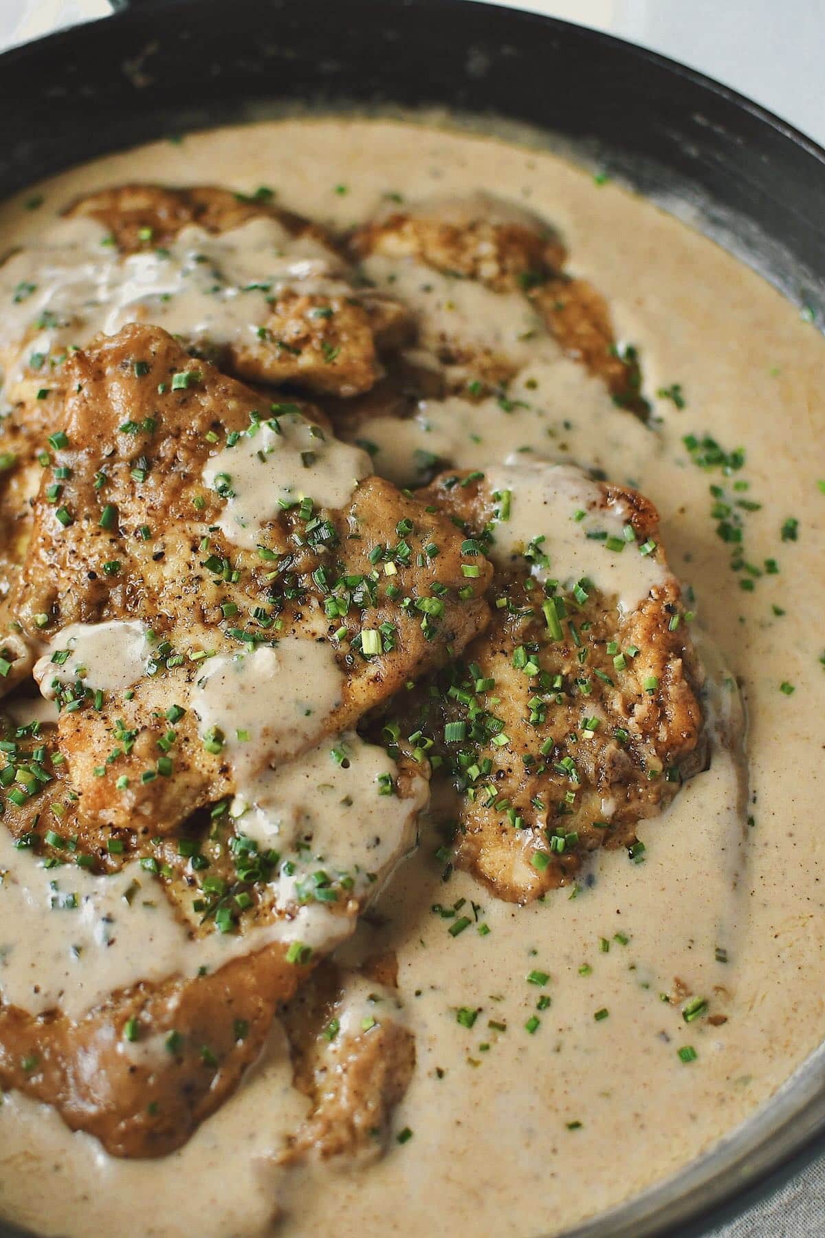 Irish Chicken in Whiskey Cream Sauce fully cooked and resting in the sauce, ready to be served.