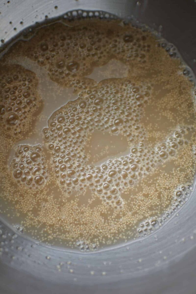 Blooming the yeast and sugar together in warm water, before the bloom.