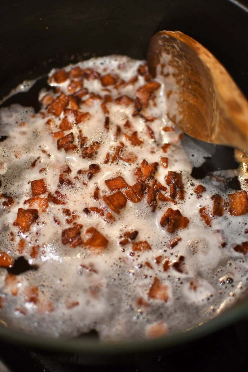Crisping bacon in the bottom of a pot.