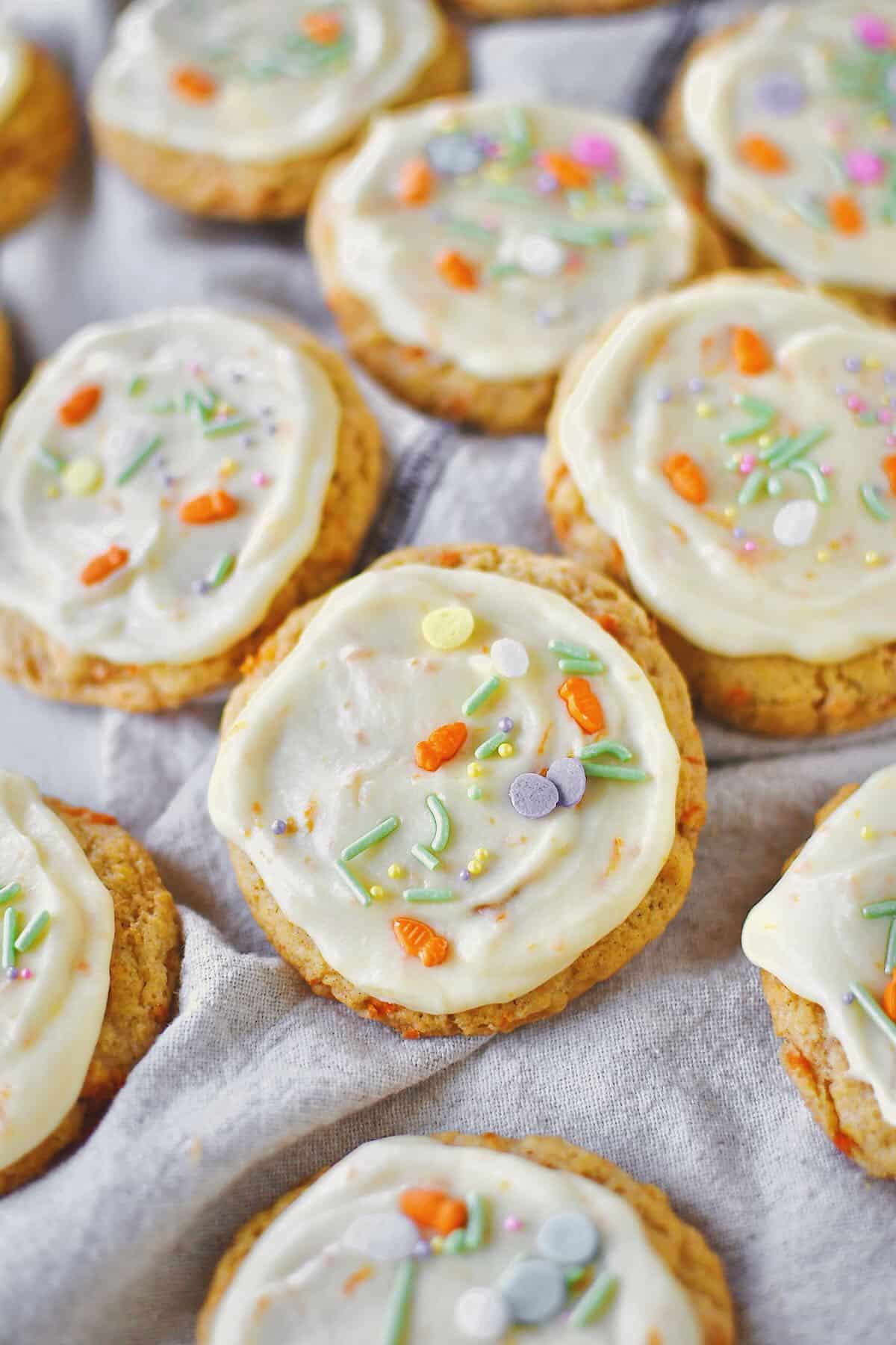 Carrot Cake Cookies laid out on a table. Festive Easter sprinkles add to this batch.