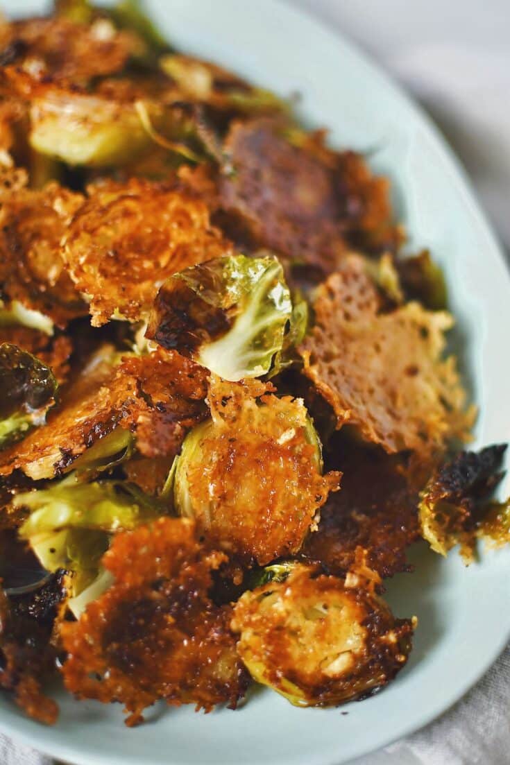 Parmesan Brussels Sprouts after cooking with the crisped cheese stuck to them, ready to eat!