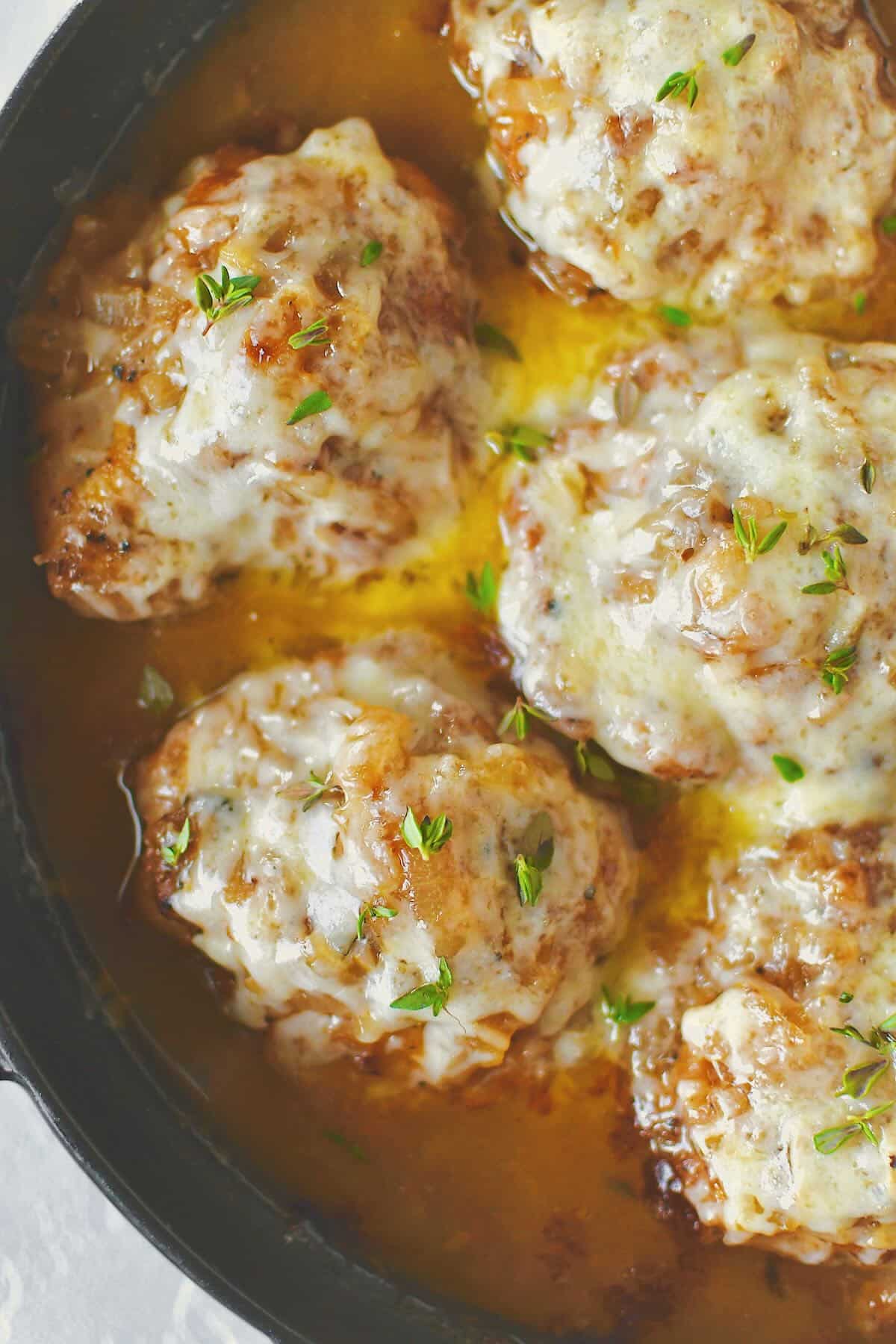 French Onion Chicken ready to eat covered in melty cheese.