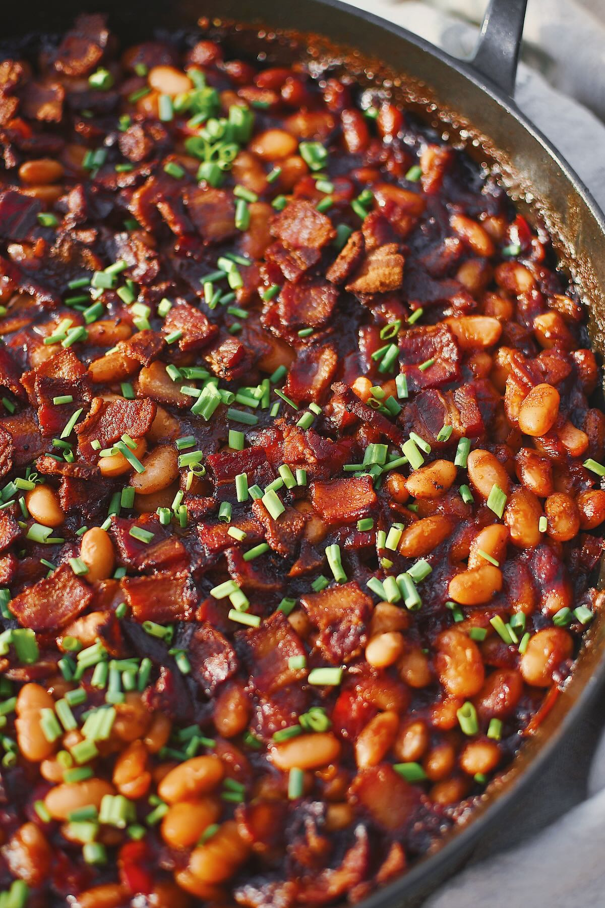 Dr. Pepper Baked Beans, just out of the oven and topped with chives.