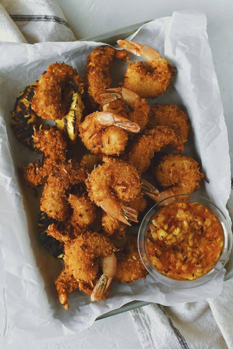 Fried Coconut Shrimp, hot and fresh and cooked to golden brown, ready to eat.