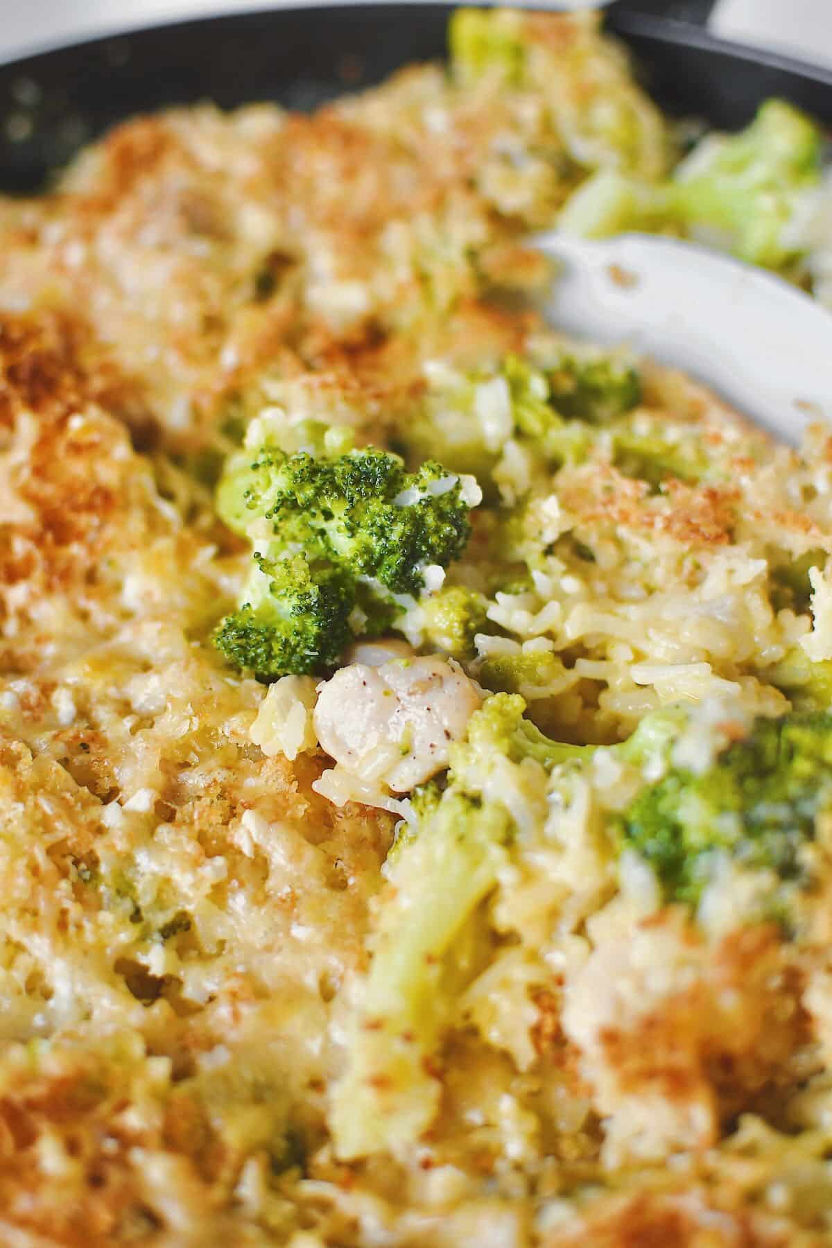 Scooping out some Chicken and Broccoli Rice Casserole.