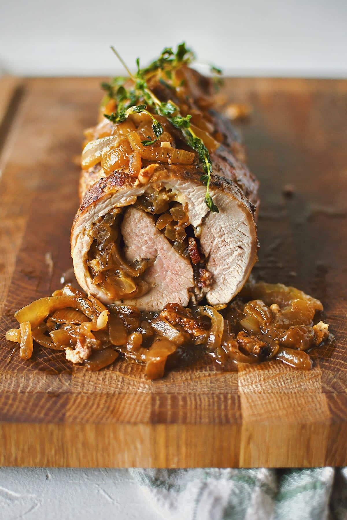 Stuffed Pork Tenderloin sliced and ready to eat.