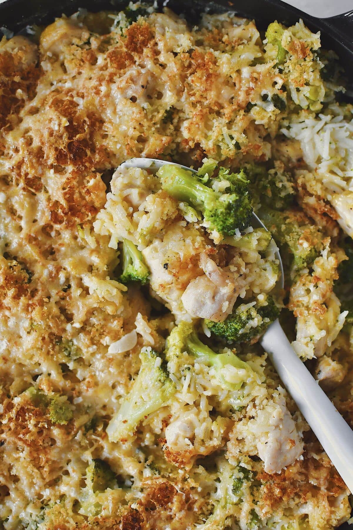 Scooping out some Chicken and Broccoli Rice Casserole.