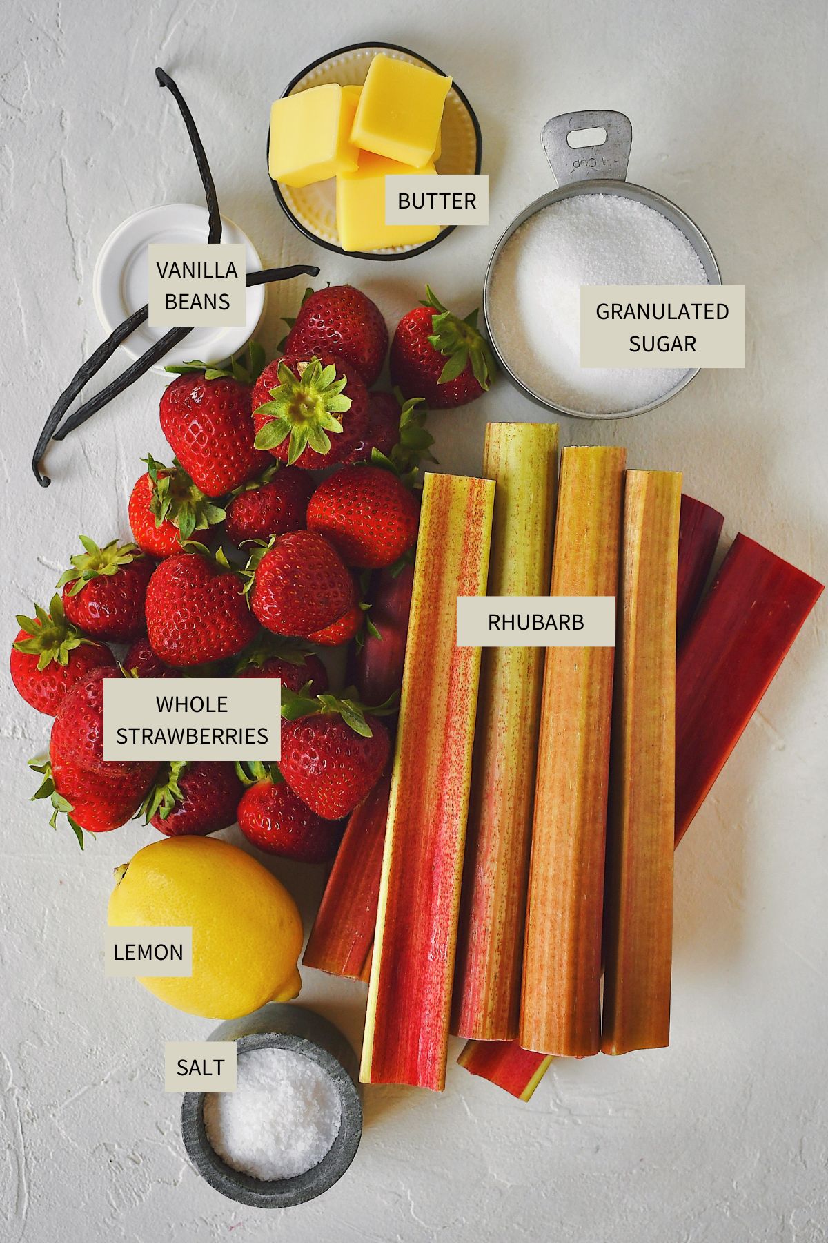 Ingredients needed to make Strawberry Rhubarb Jam.