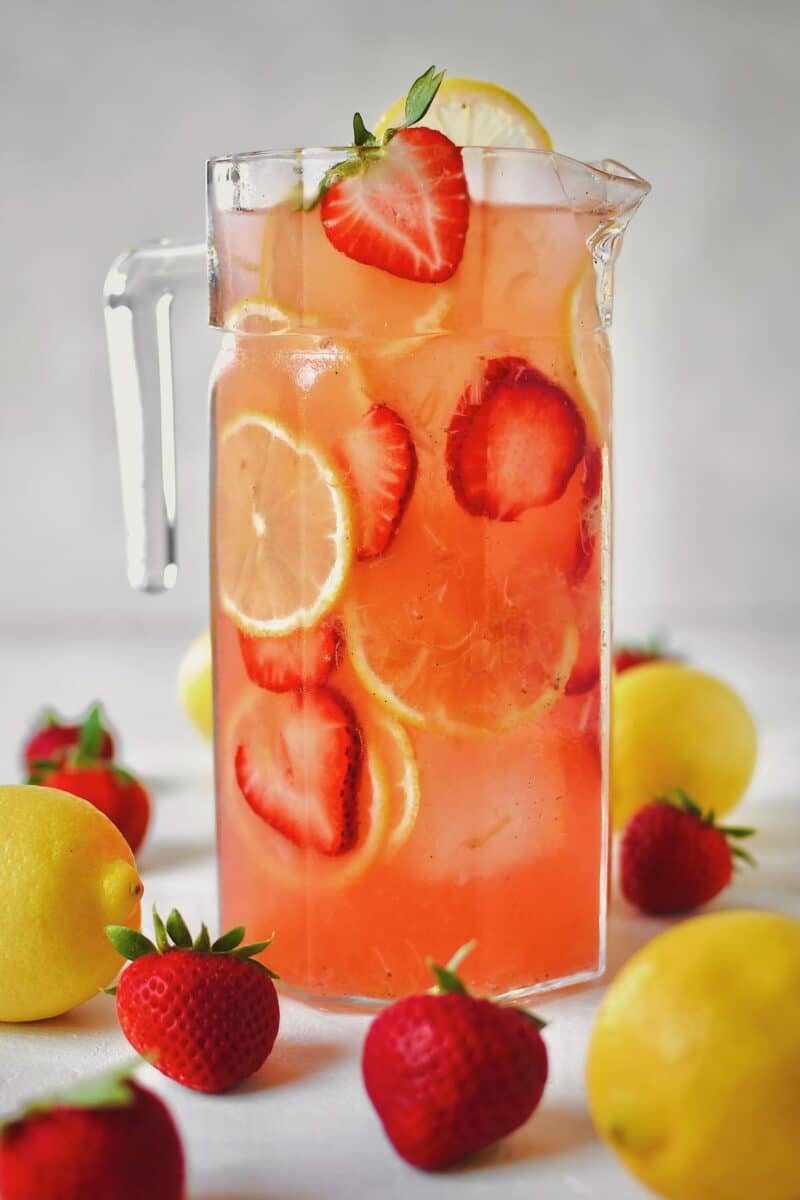 Pitcher of Strawberry Lemonade ready to be poured and enjoyed.