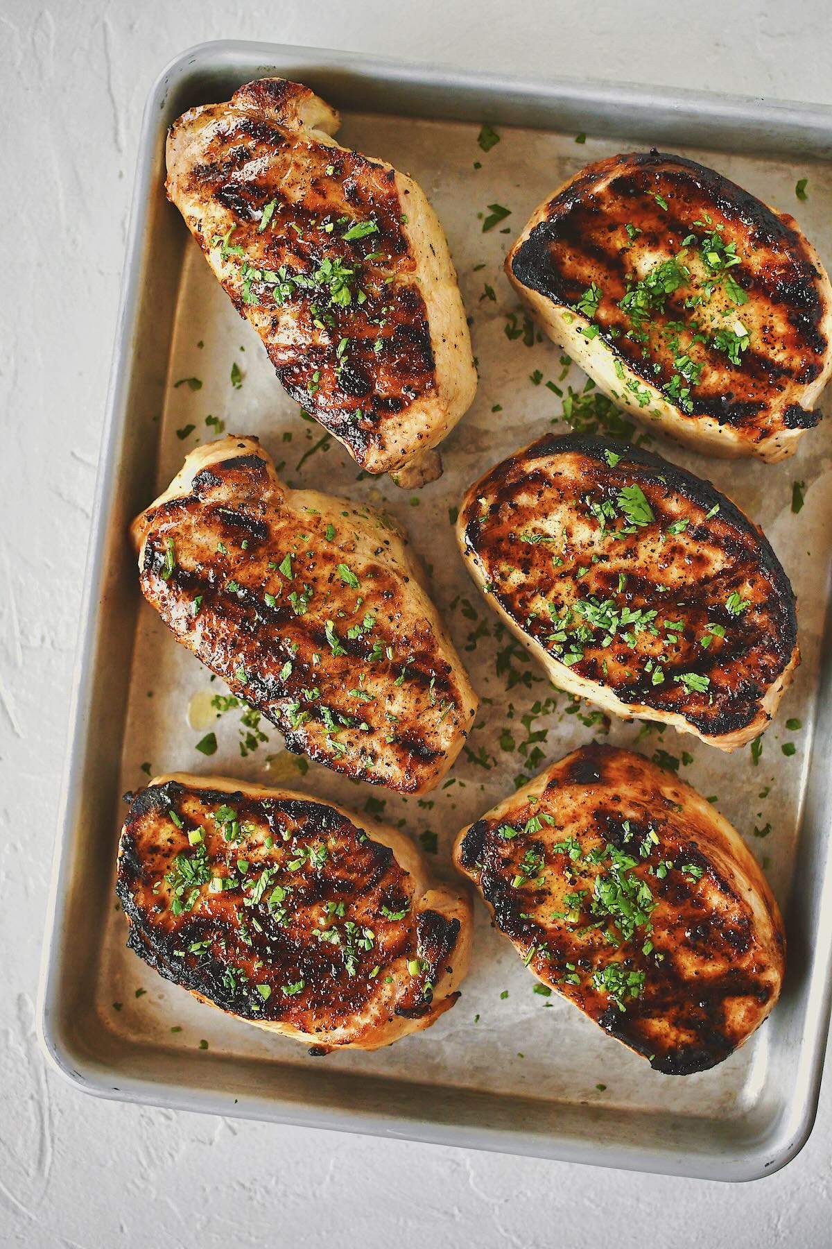 Brined Pork Chops just off the grill, ready to eat.