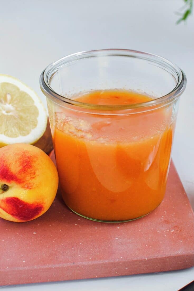 Peach Jam Recipe, in a jar cooling.