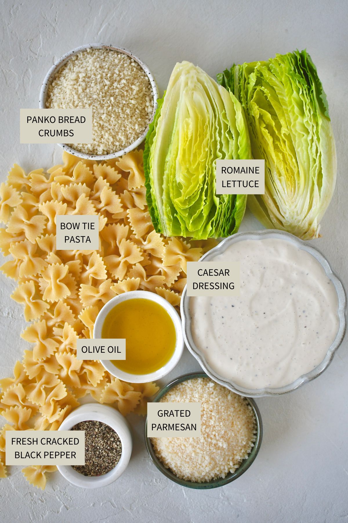 Ingredients needed to make Caesar Pasta Salad.