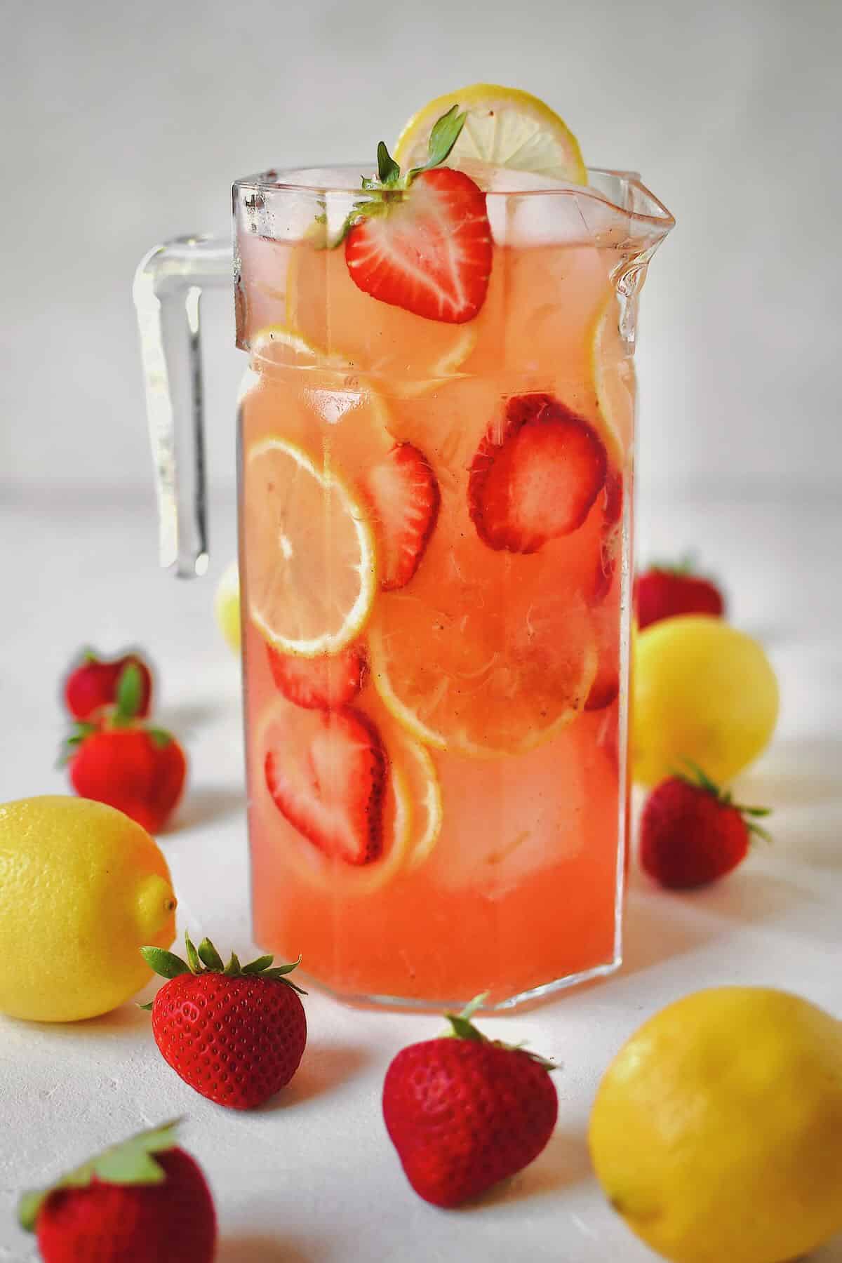 Pitcher of Strawberry Lemonade ready to be poured and enjoyed.