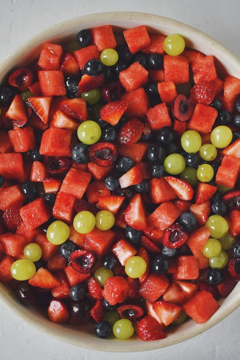 All ingredients in a large bowl after tossing.